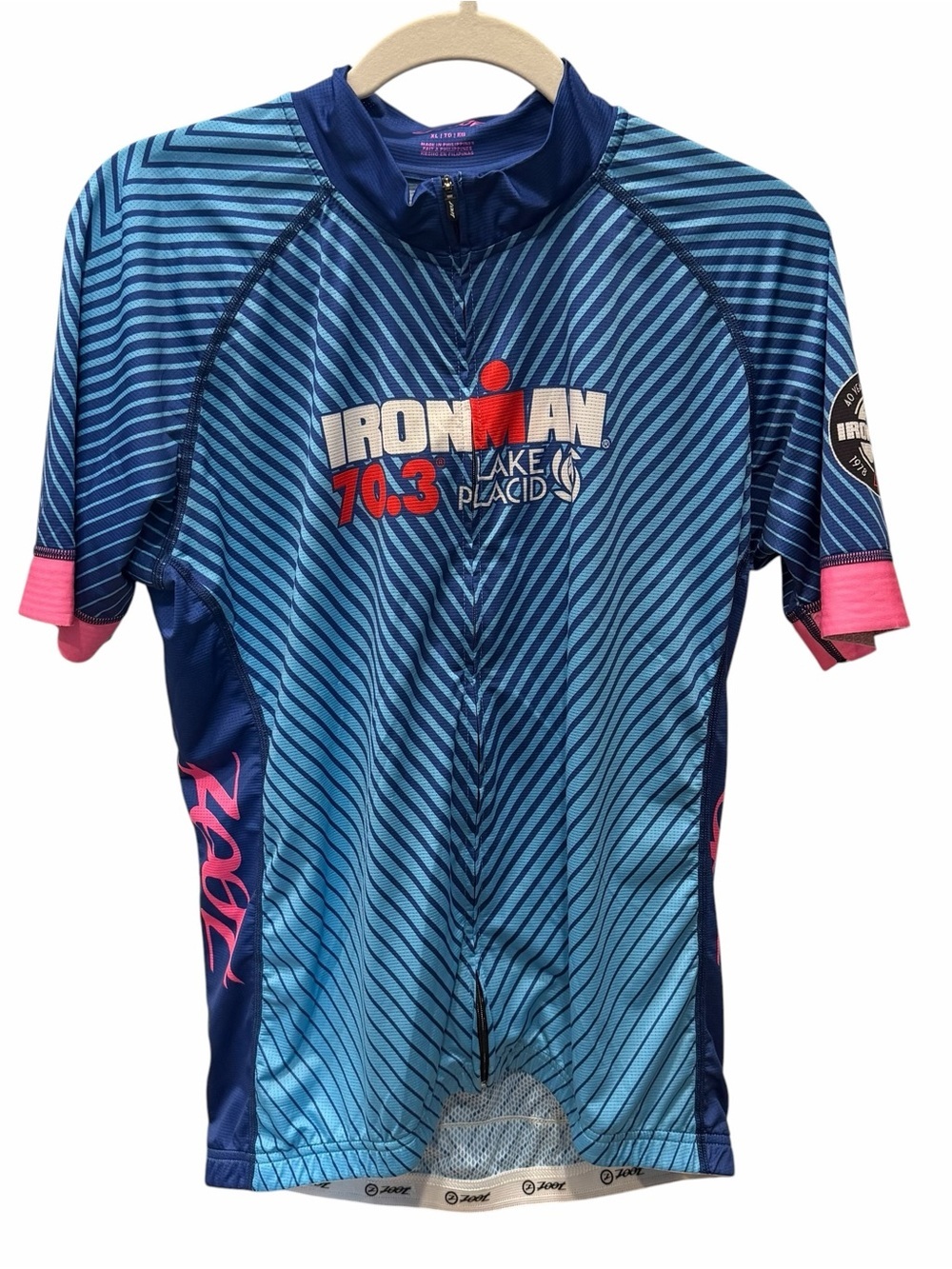 Zoot Women's Blue and Pink Striped Short-Sleeve Lake Placid 70.3 Ironman Jersey
